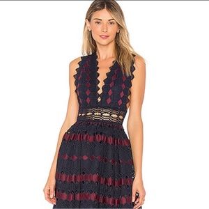 X by NBD navy and burgundy midi dress size xs never worn.